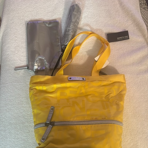 A Kenneth Cole SATCHEL bag with matching umbrella and pouch